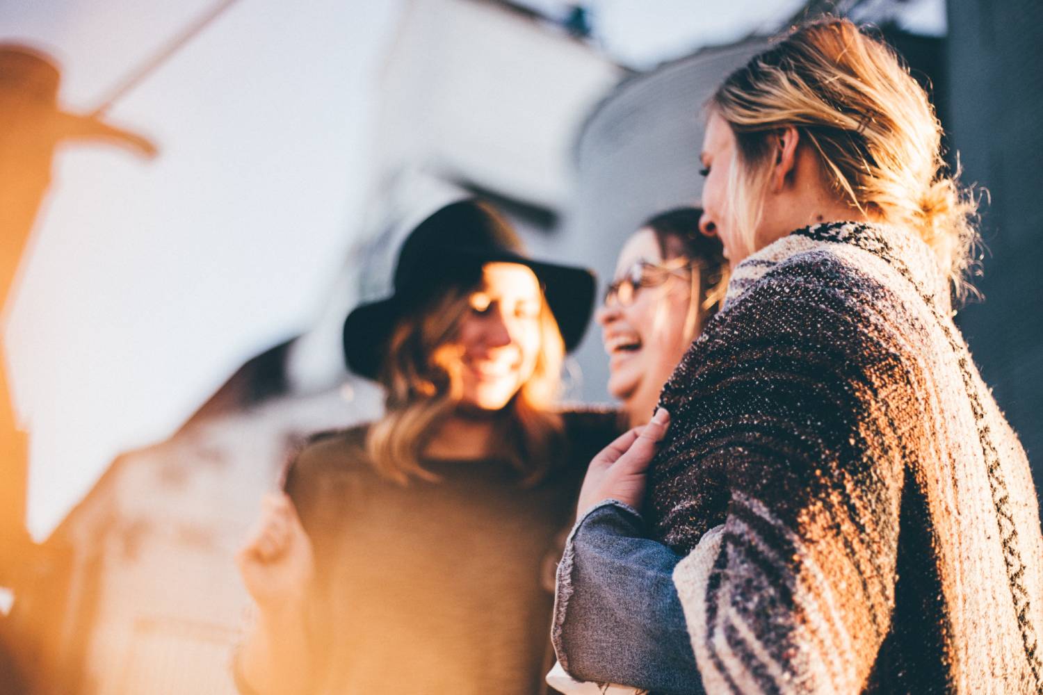 a group of women standing next to each other